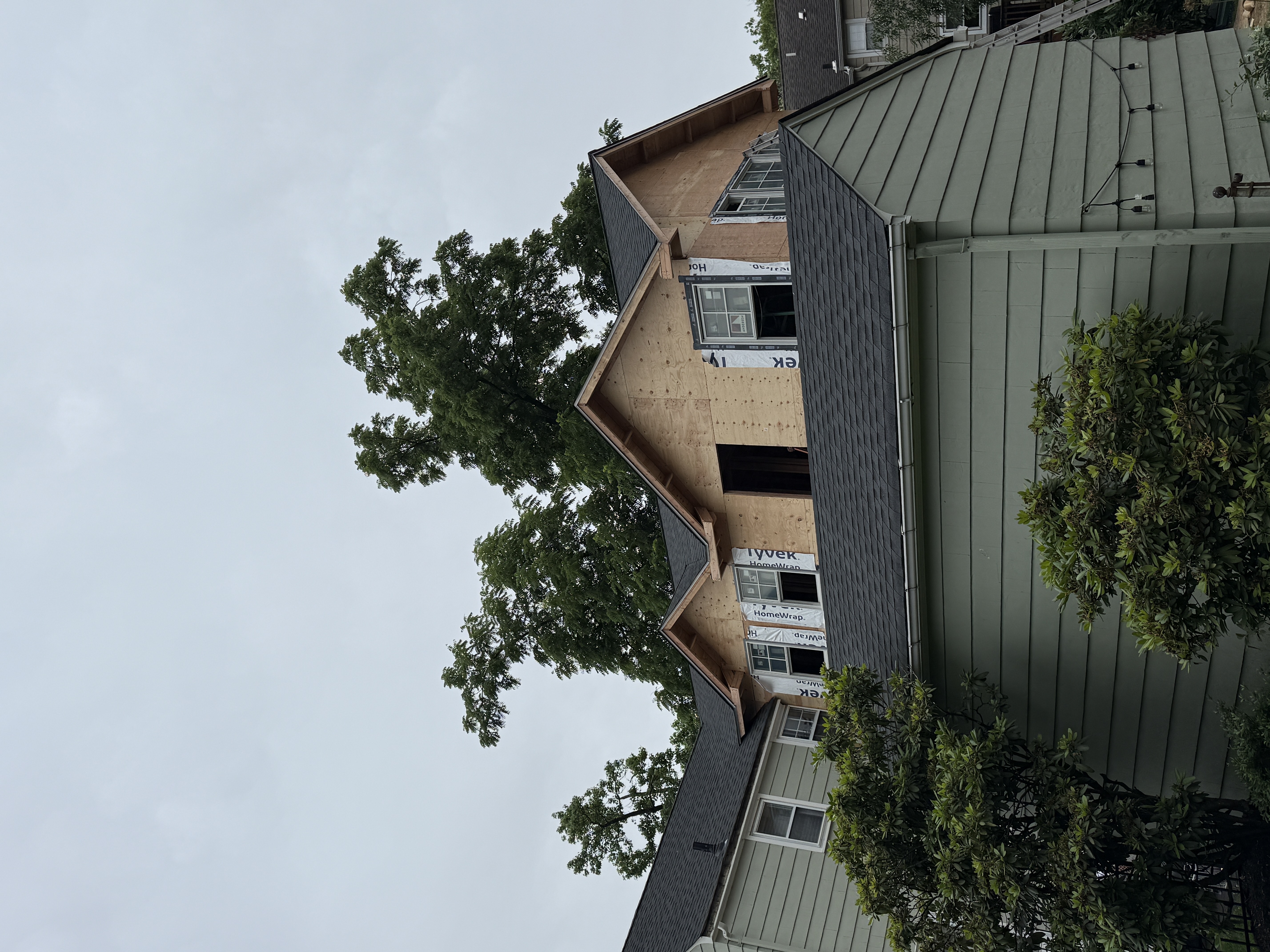 House renovation with new roofing in progress